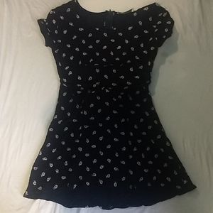 Navy blue mini dress with white flower print.
